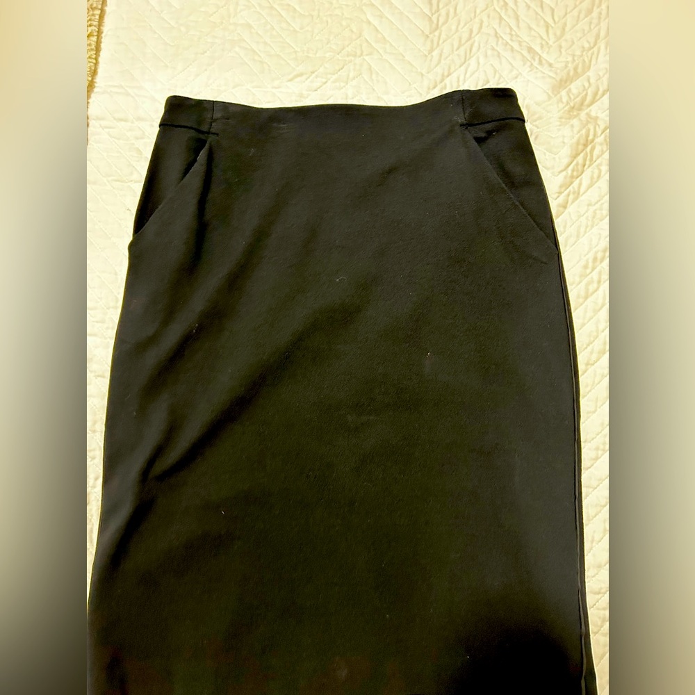 Pencil black skirt, pockets, size 10, split in the back, never worn